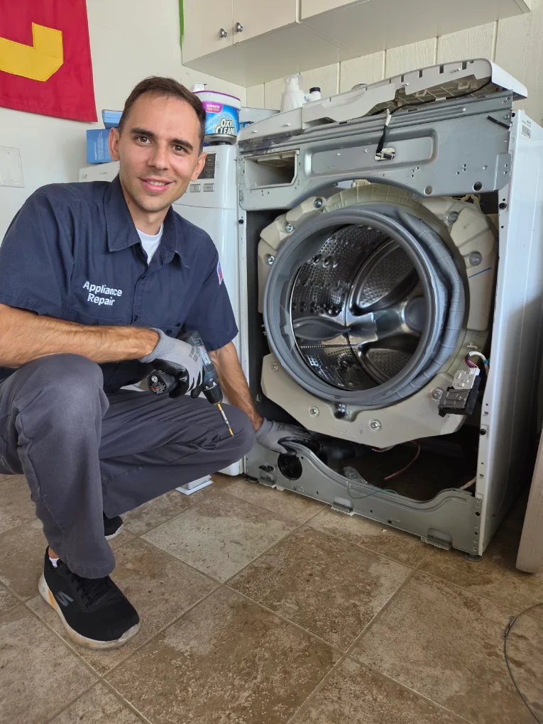 Front-load washer repair with front panel removed, Tustin, CA